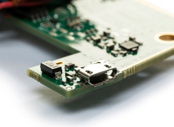 Close up showing USB connector on bare circuit board version of CAN bus interface and data logger