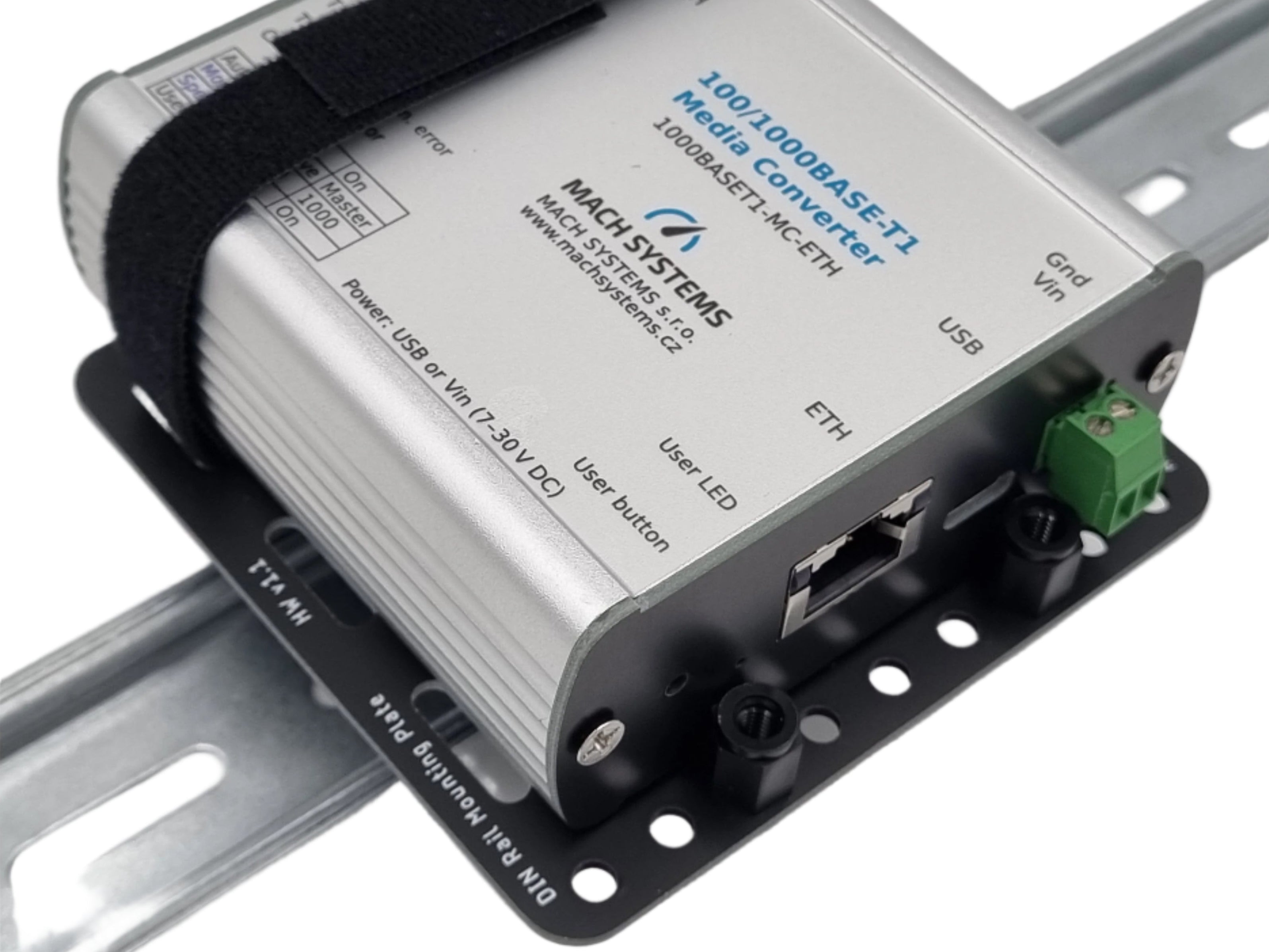 Mach Systems Mounted Universal DIN Rail Bracket, slanted front face image with Velcro strapped 100/1000Base-Ti Media Converter view